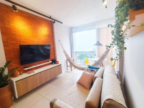Apt pé na areia